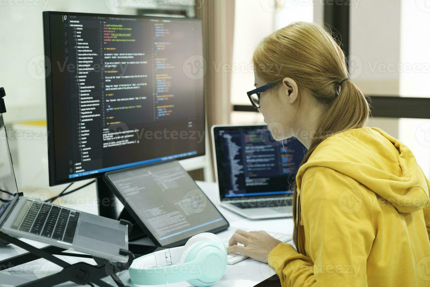 Programmer is coding and programming software. photo