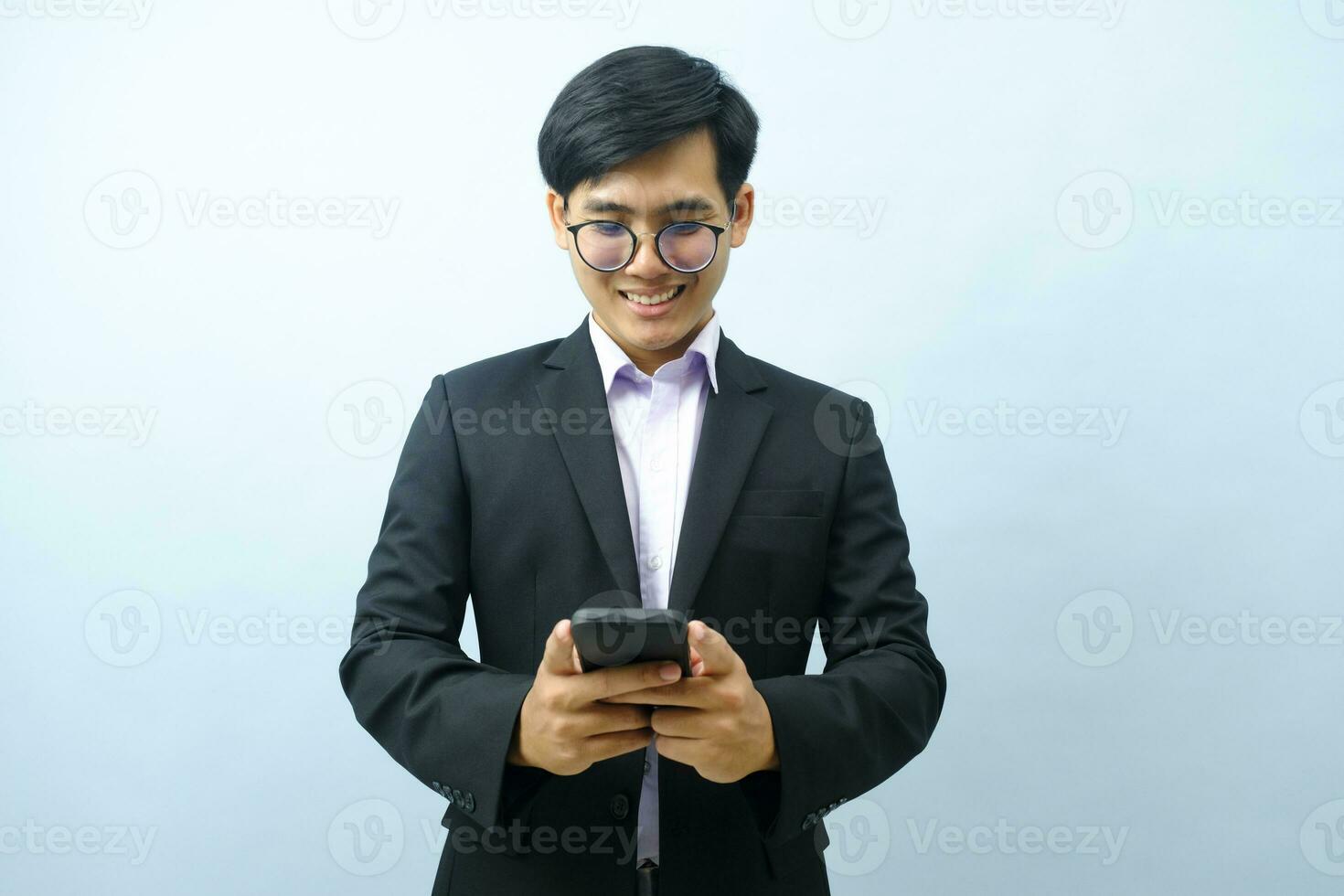 Portrait of businessman using smartphone. photo