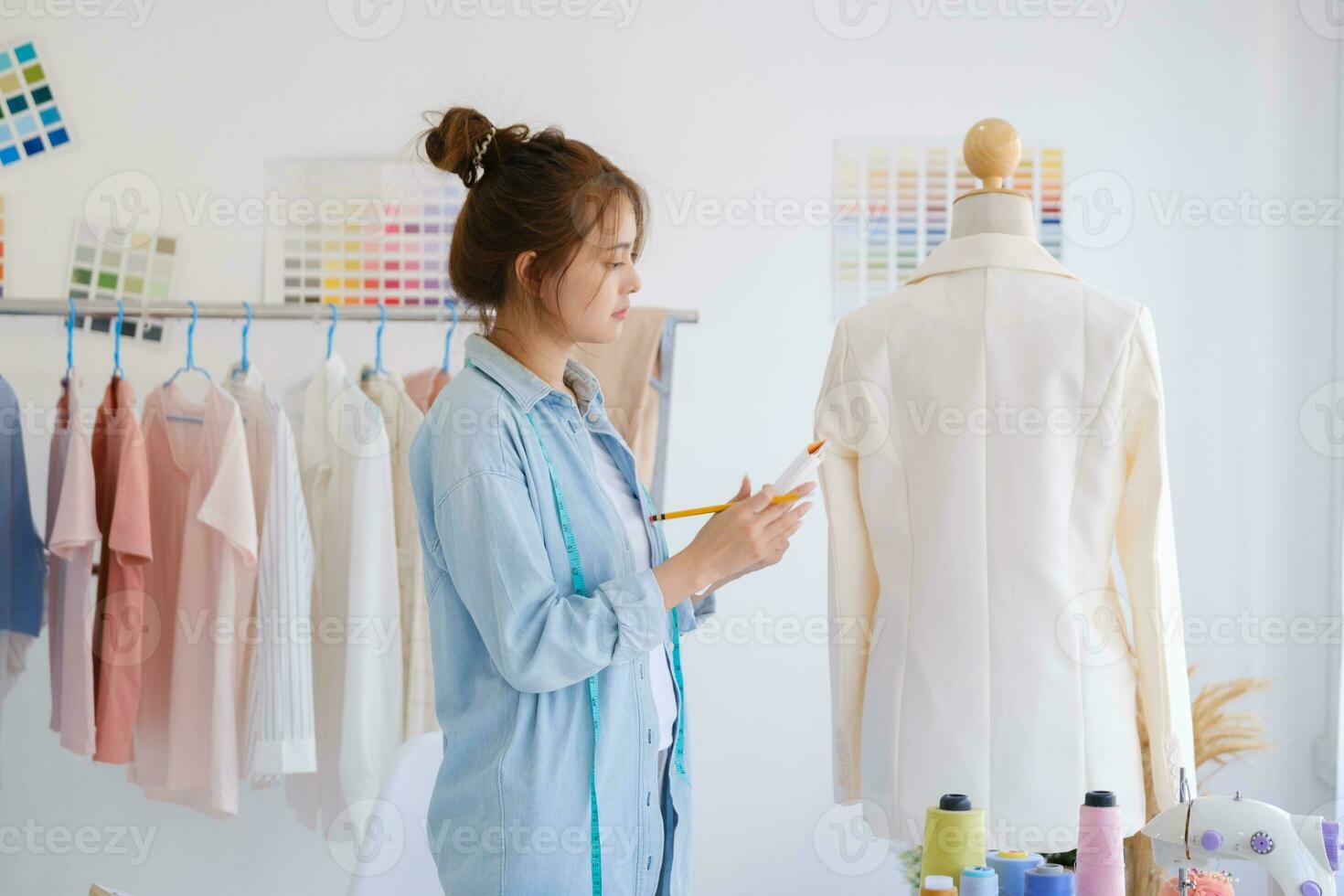 Fashion designer working in studio photo