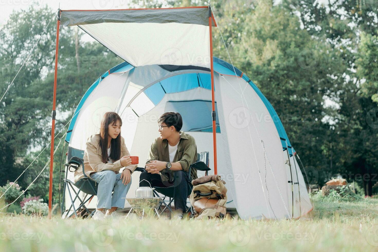 Happy couple camping life at park photo
