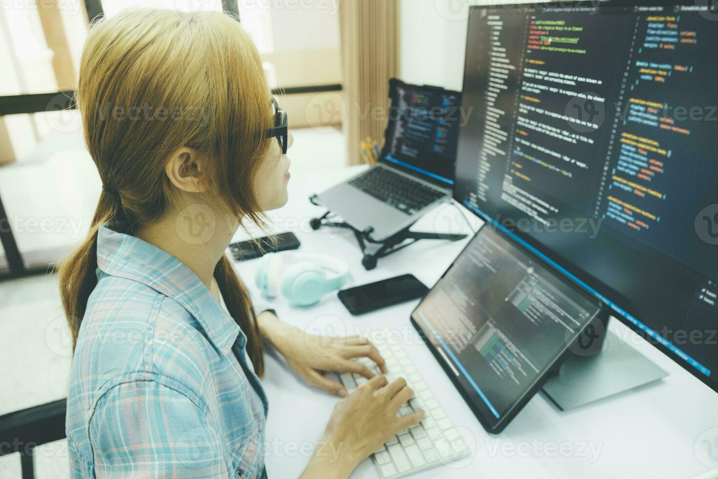 Programmer is coding and programming software. photo