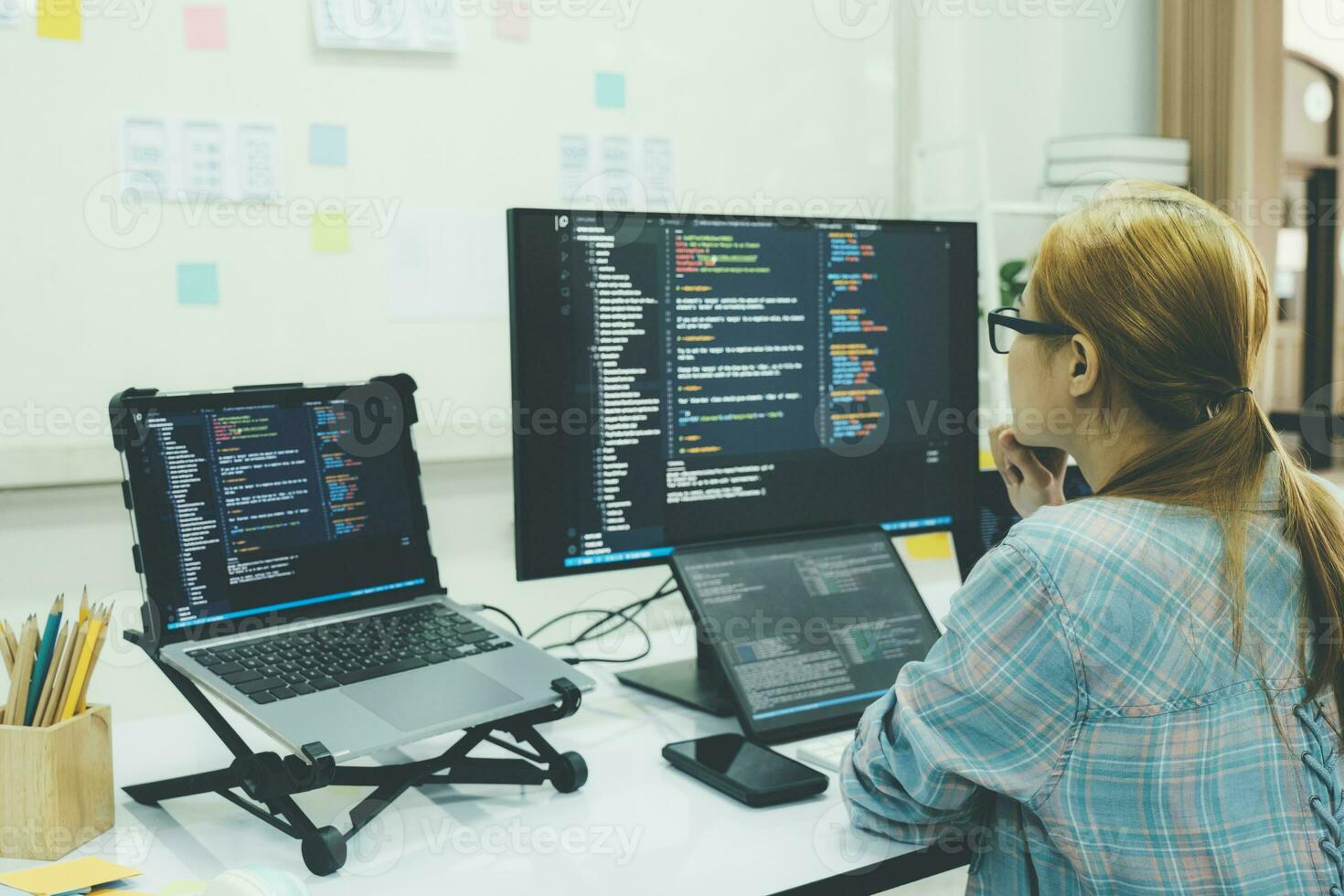 Programmer is coding and programming software. photo