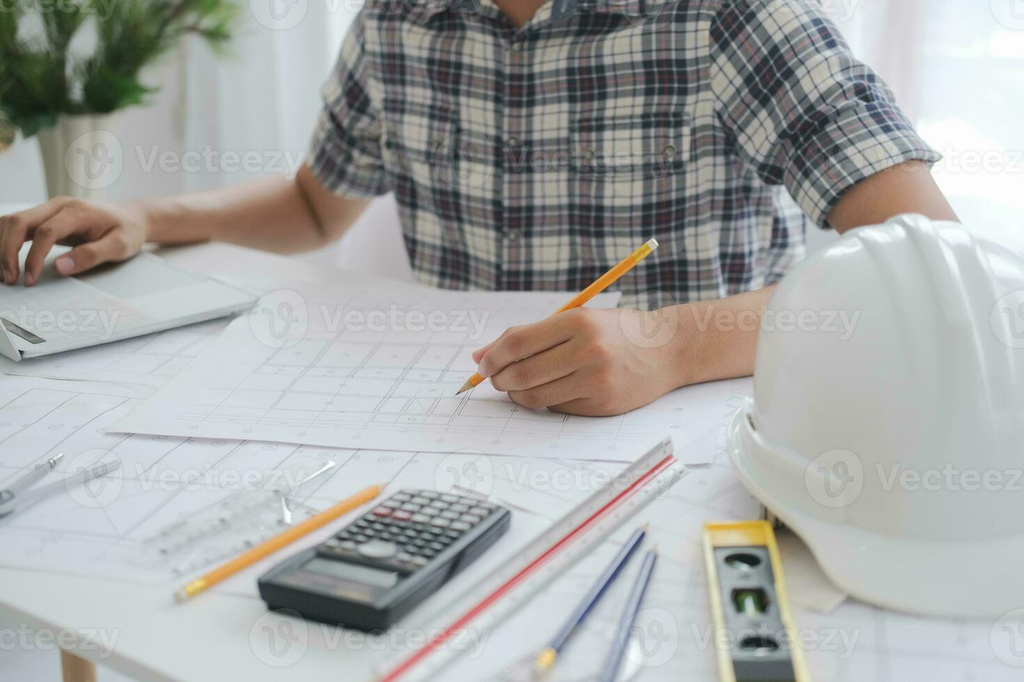 Architect or engineer working in office photo