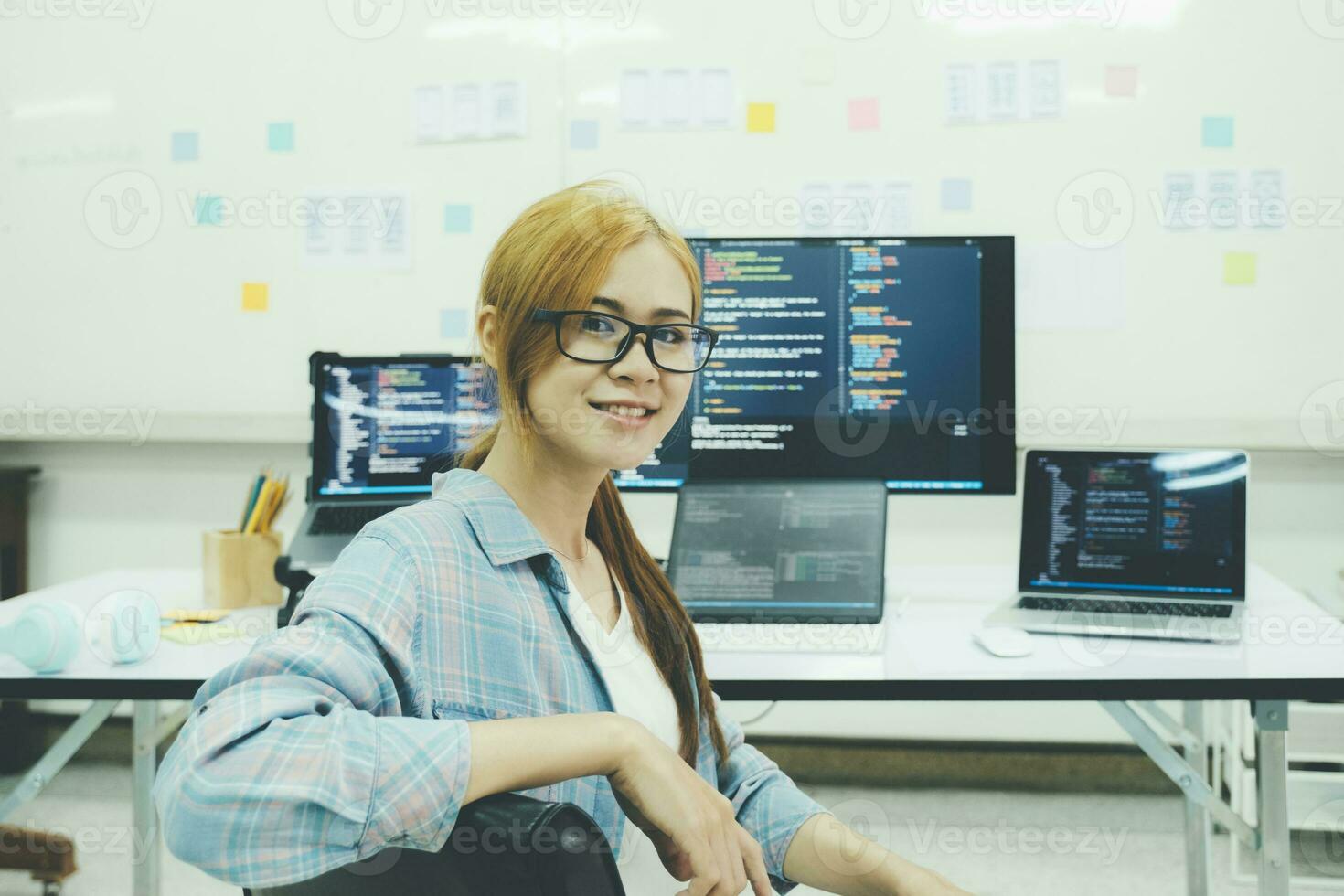 Programmer is coding and programming software. photo