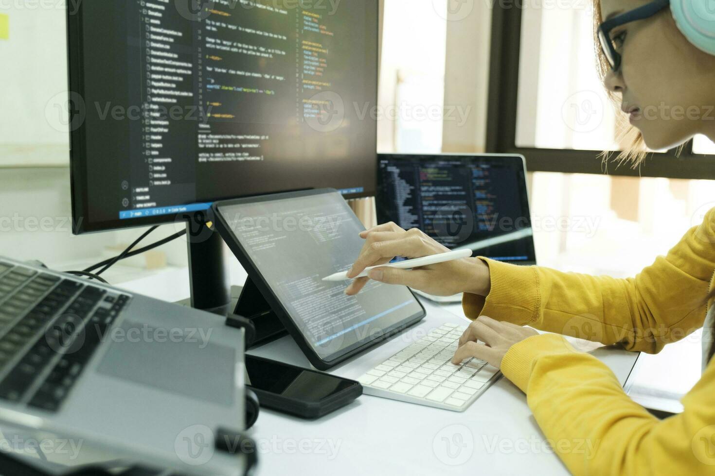 Programmer is coding and programming software. photo