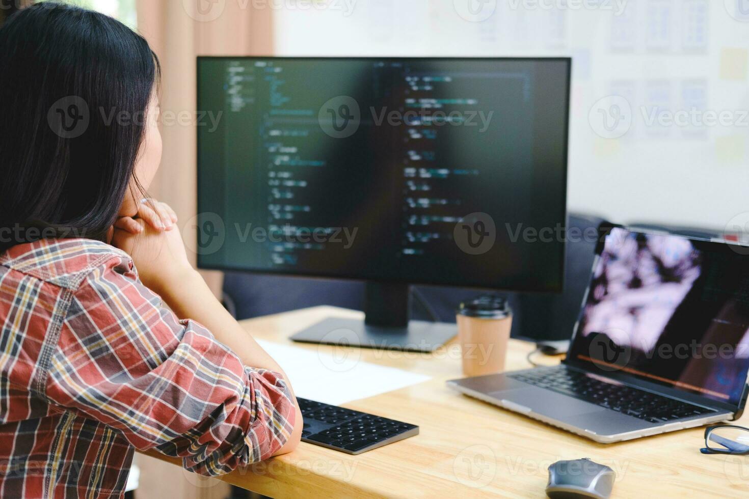 Programmers and developer teams are coding and developing software photo