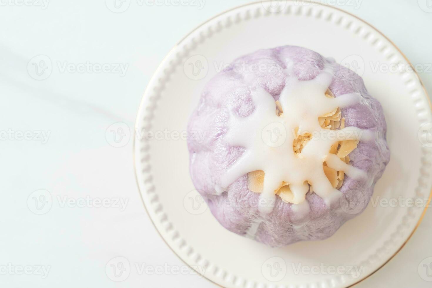 taro bun with white sugar cream and nut photo