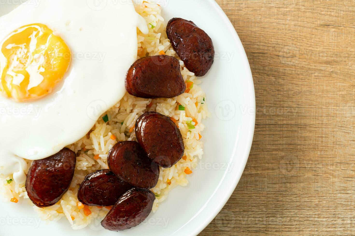 fried rice with fried egg and Chinese sausage photo