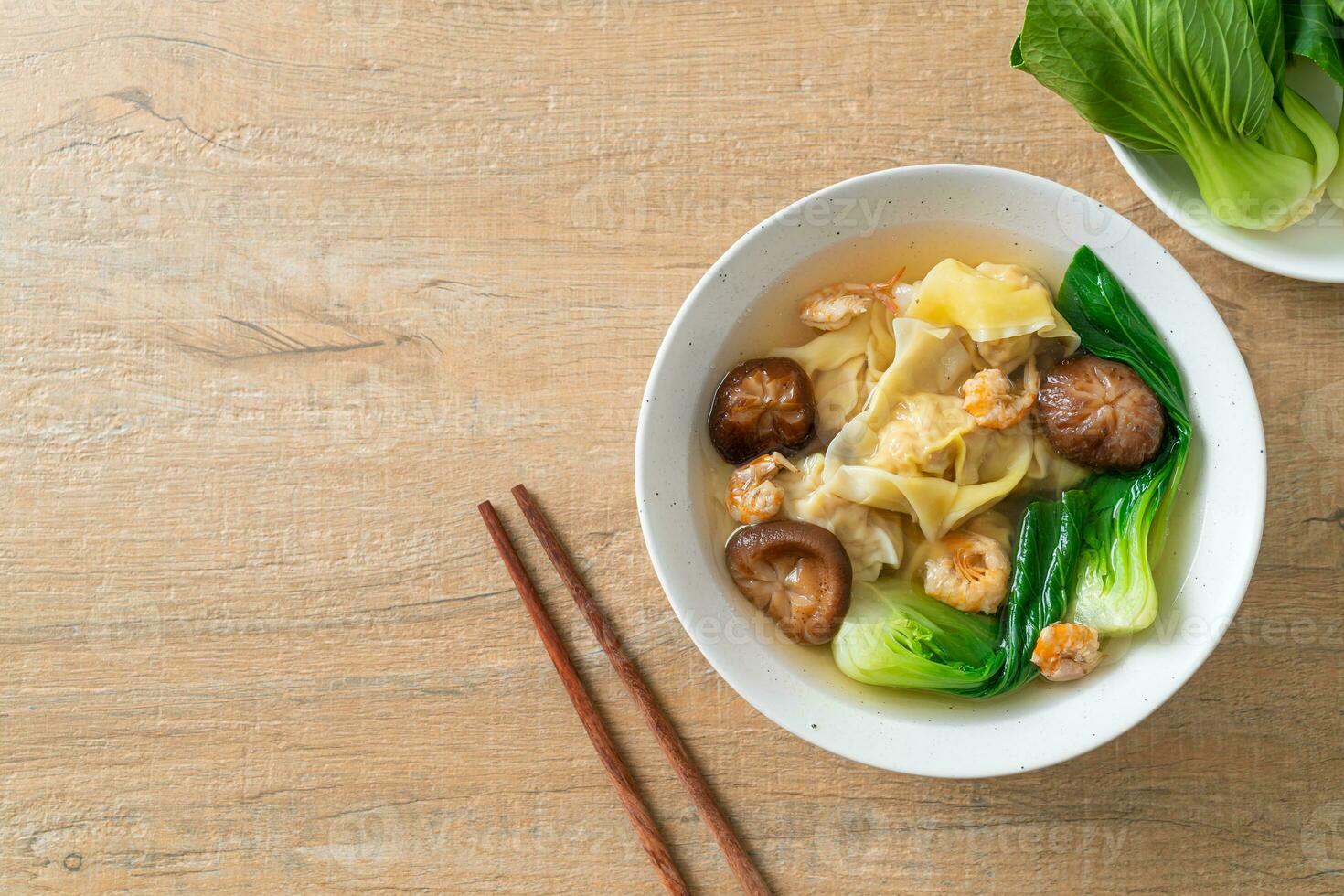 pork dumpling soup with shrimps and vegetable photo