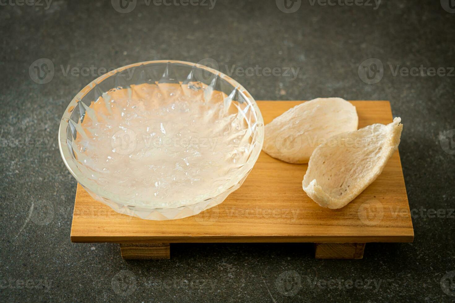 Edible bird's nest soup in glass bowl photo