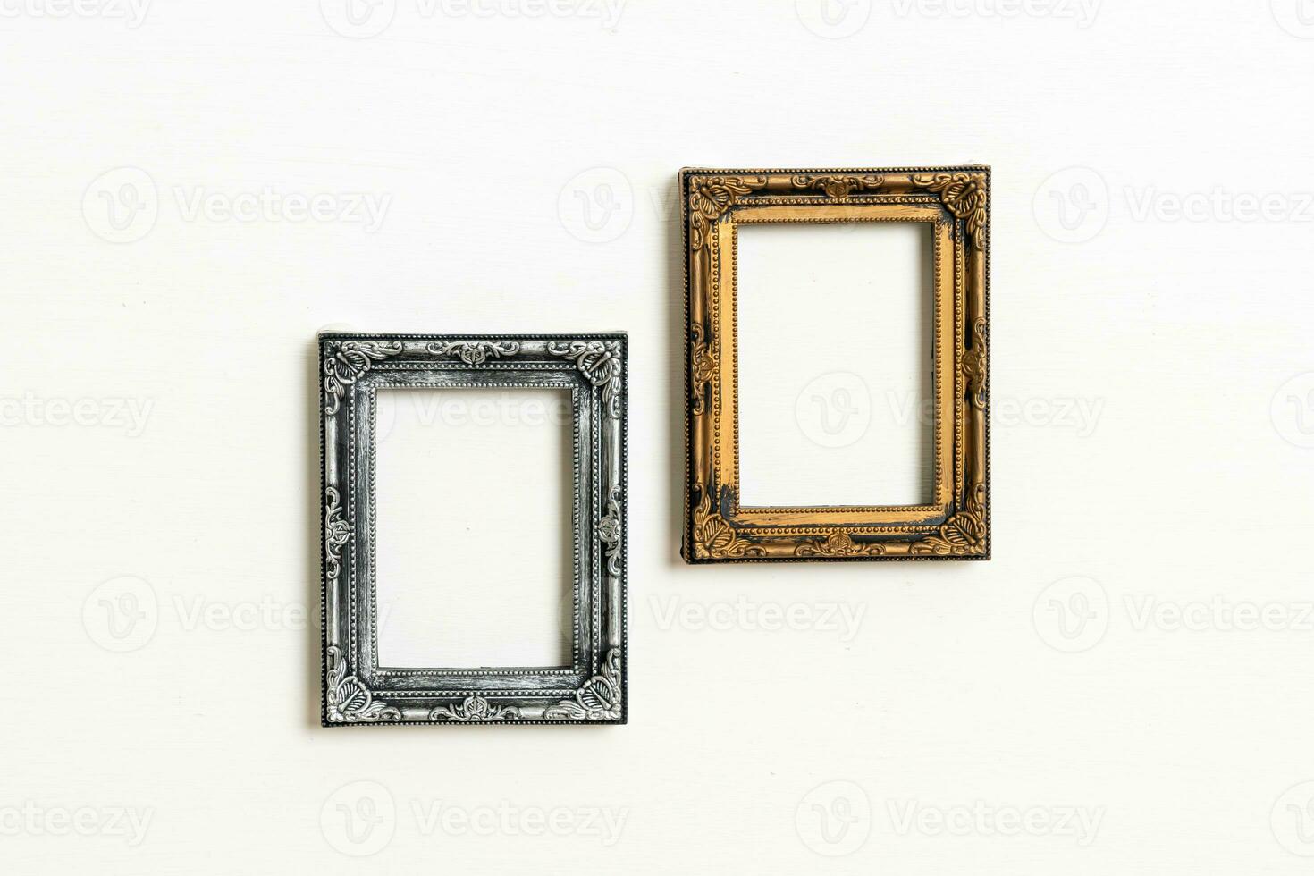 empty picture frame on white wall background photo