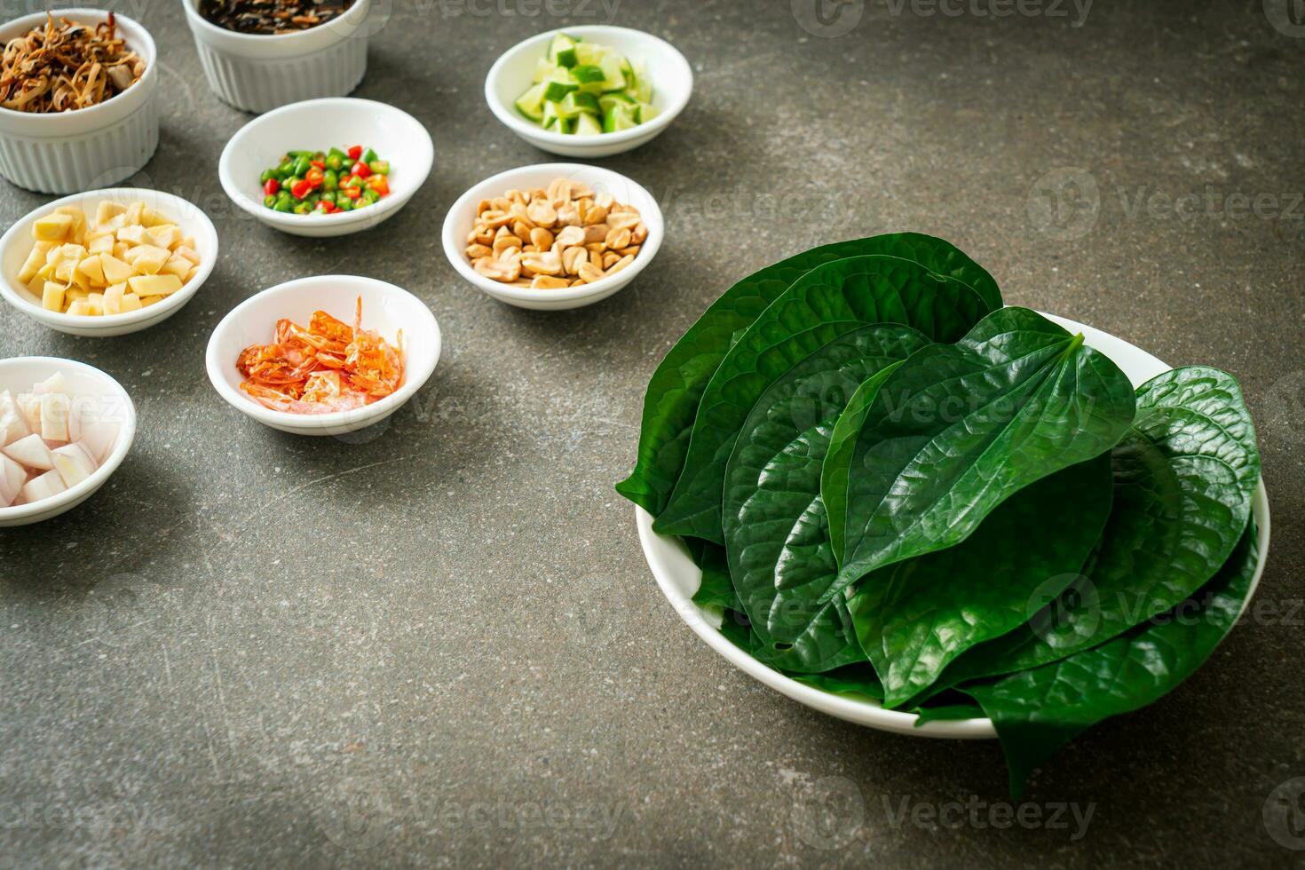 Miang kham A royal leaf wrap appetizer 24782570 Stock Photo at Vecteezy
