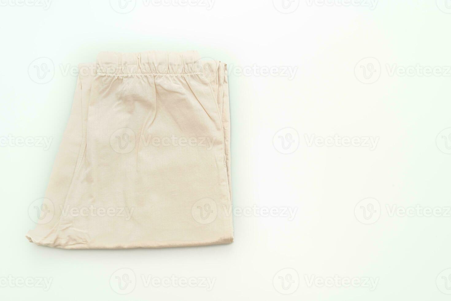 beige pant fold on white background photo
