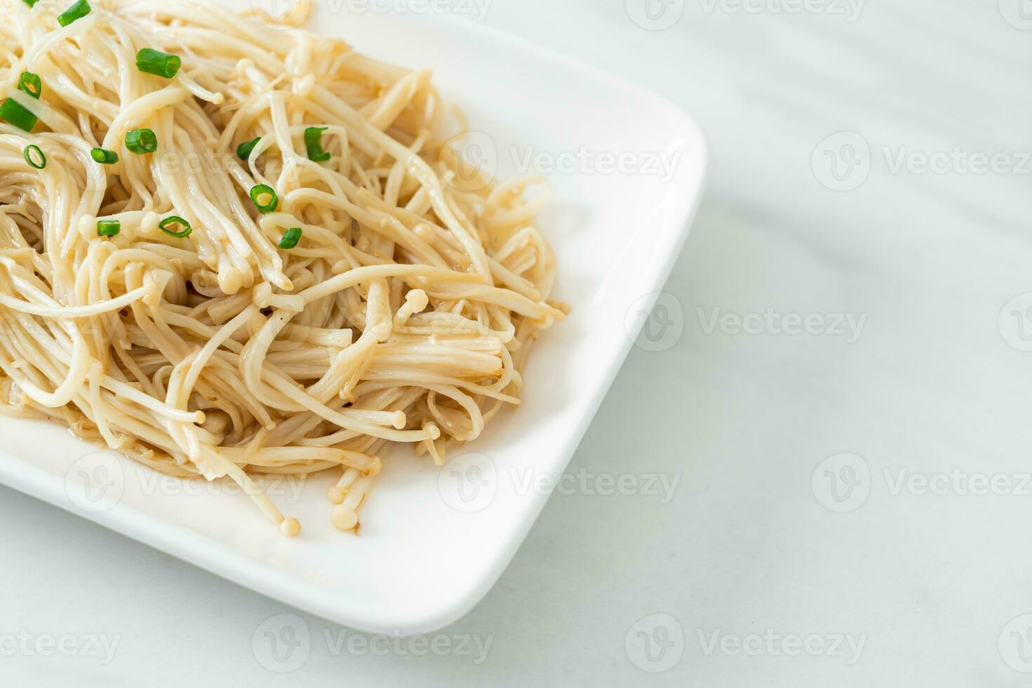 stir-fried golden needle mushroom with butter photo
