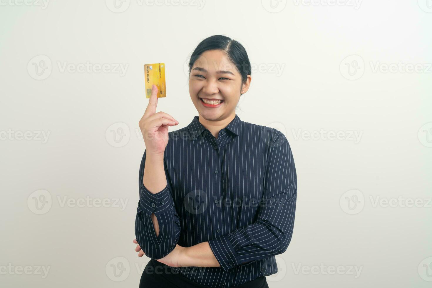 Asian woman holding credit card with white background photo