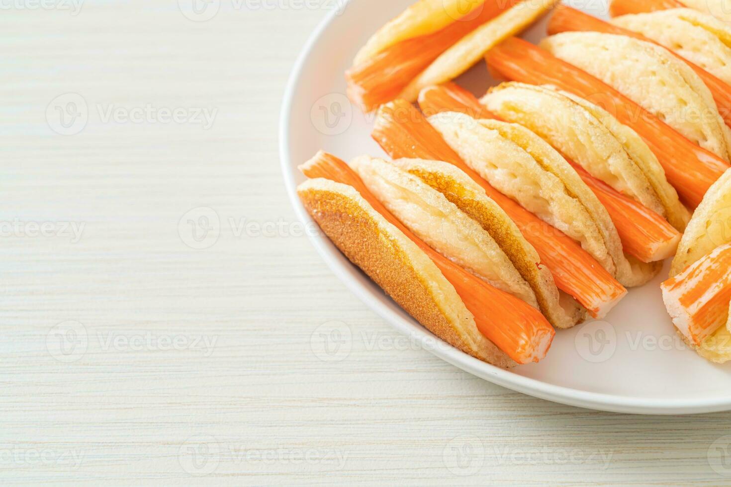 flat pancake roll with crab stick photo