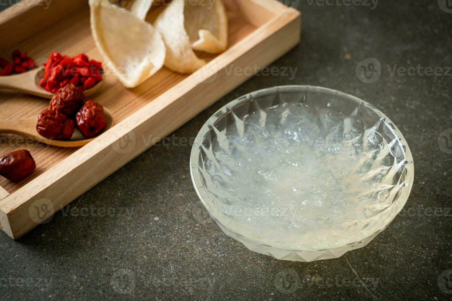 Edible bird's nest soup in glass bowl photo