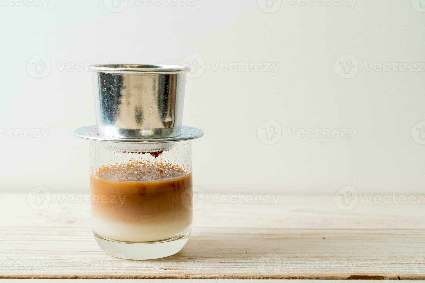 Hot milk coffee dripping in Vietnam style photo