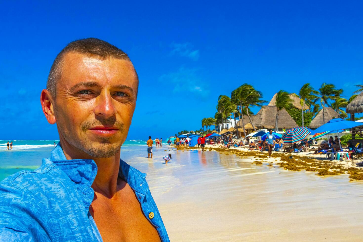 Male tourist Travelling man taking selfie Playa del Carmen Mexico. photo