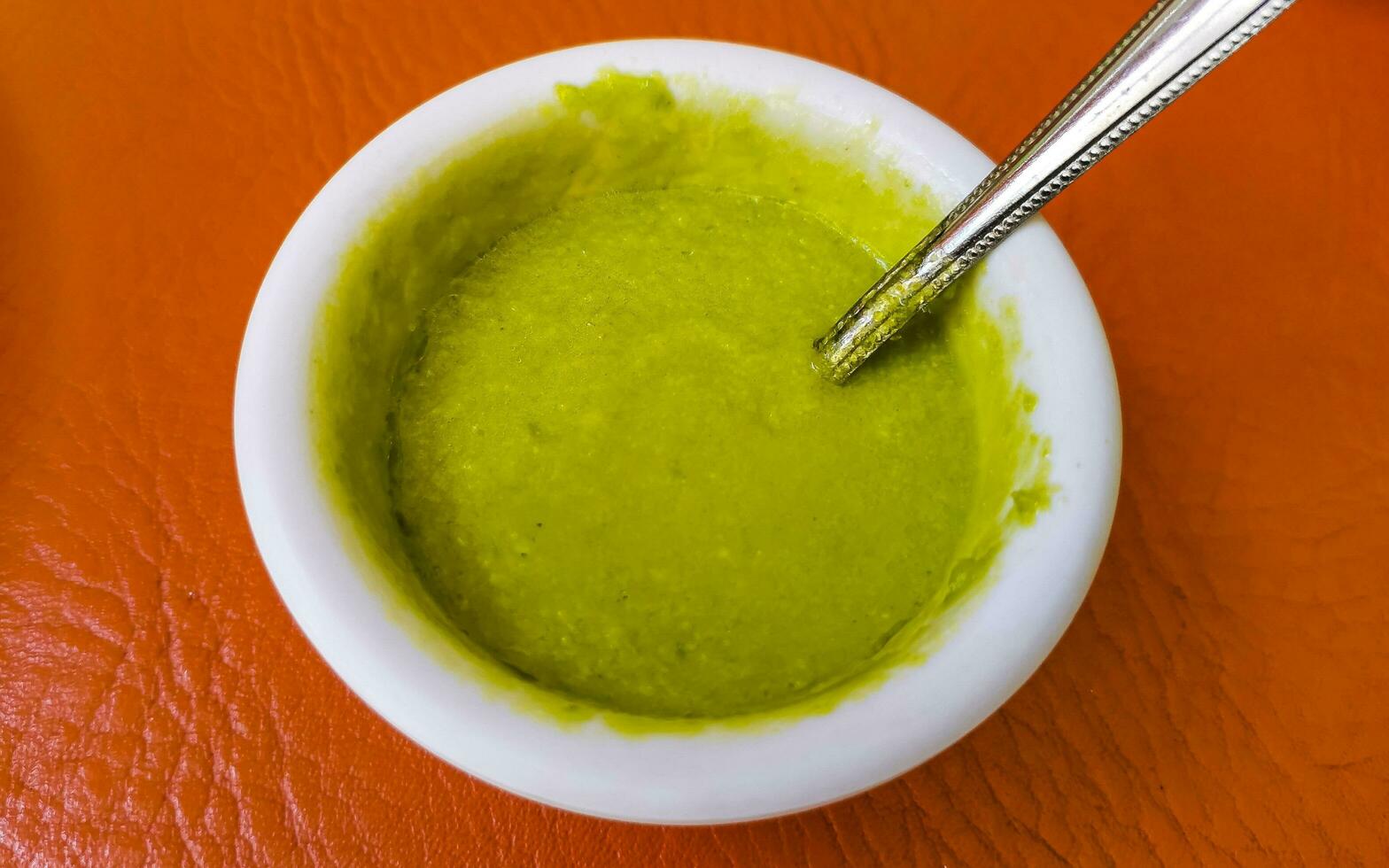 Green spicy Mexican sauce in Playa del Carmen Mexico. photo