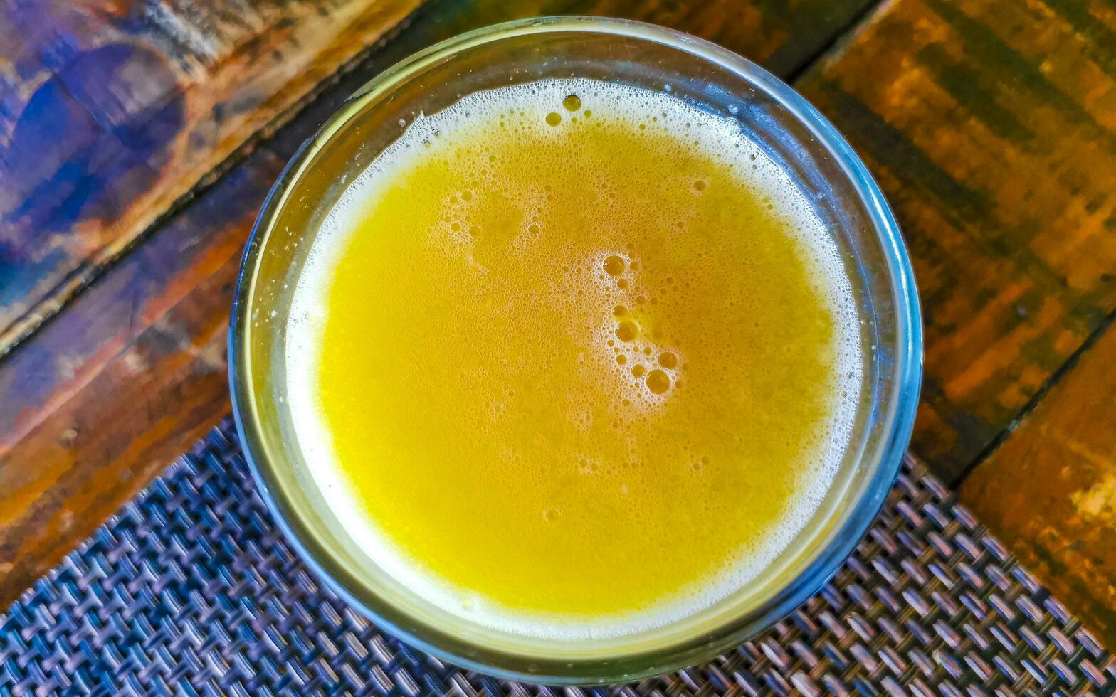 Orange fruit juice in restaurant PapaCharly Playa del Carmen Mexico. photo