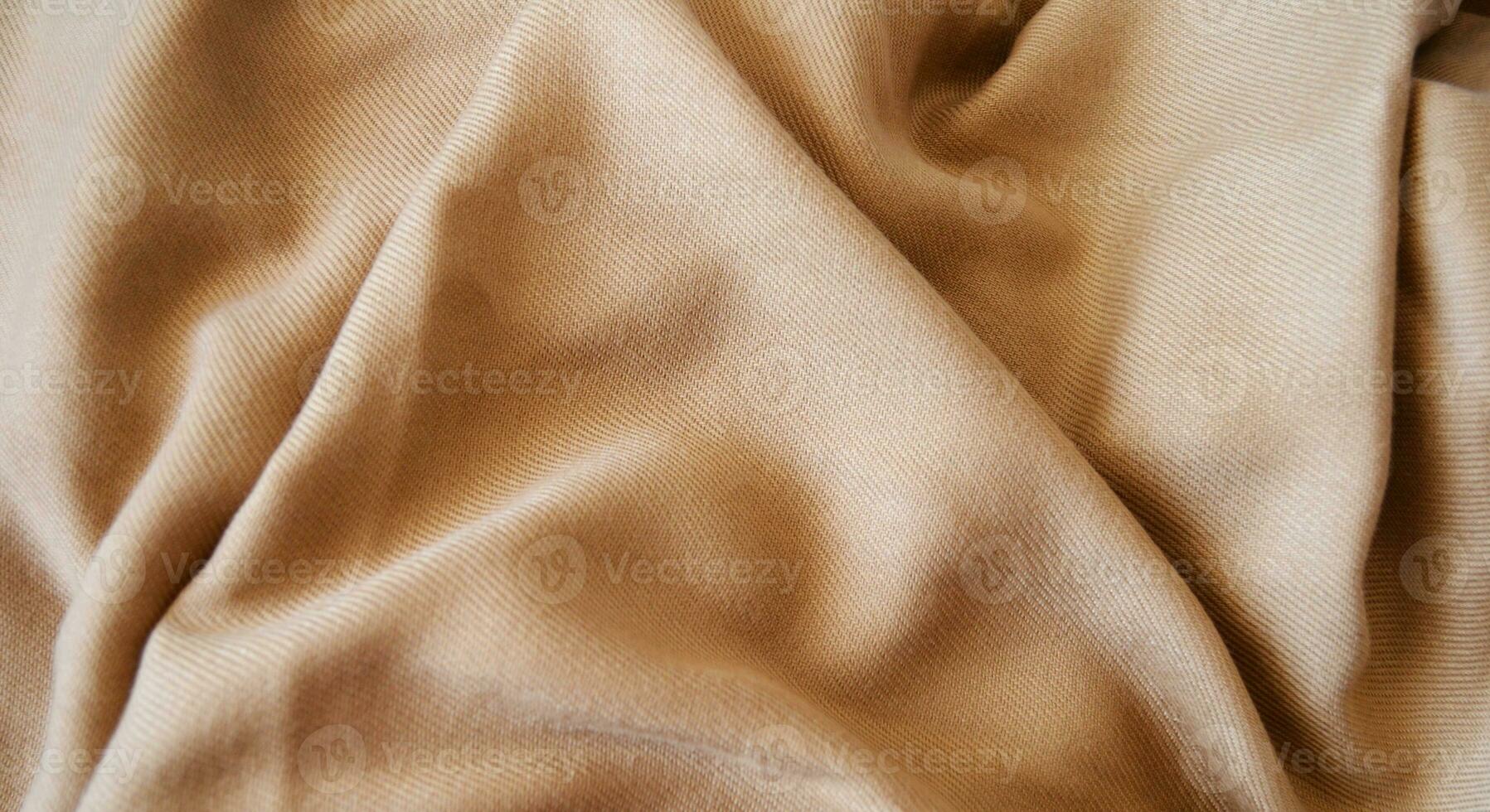 gold fabric background, silk fabric, satin textile texture, abstract background, luxury background photo