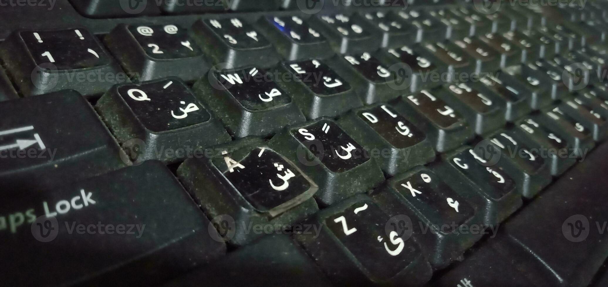 objeto fotografía - negro teclado con Arábica letra llaves foto