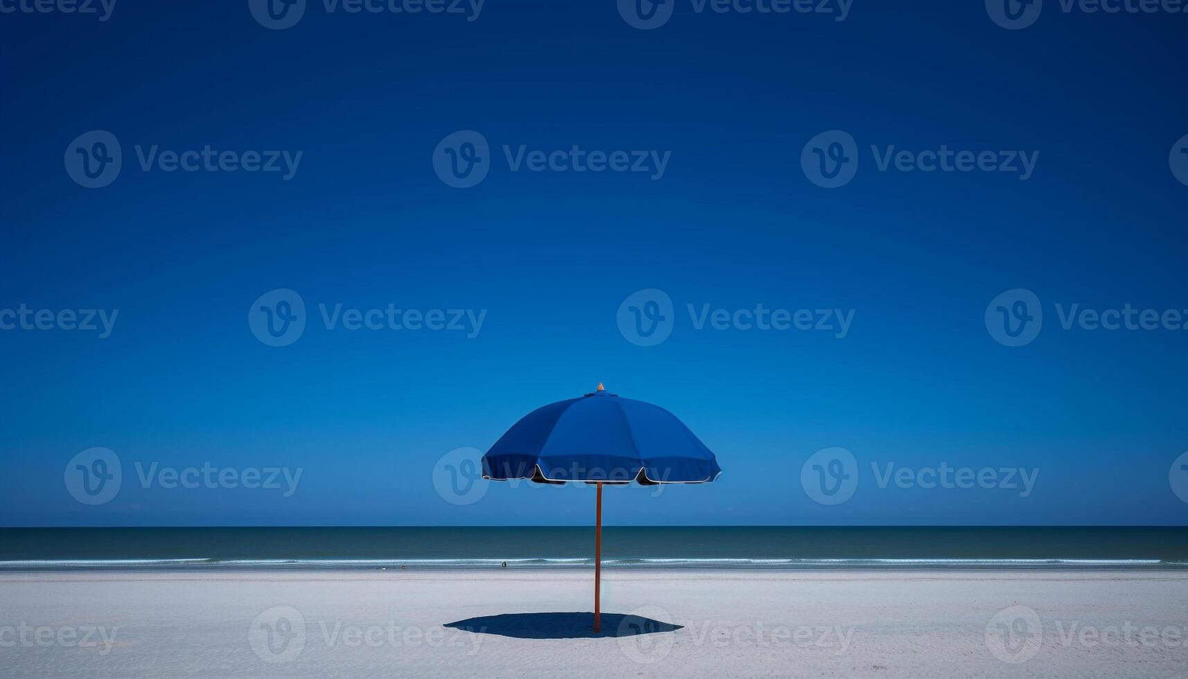 Blue umbrella shades lone beachgoer at sunset generated by AI photo