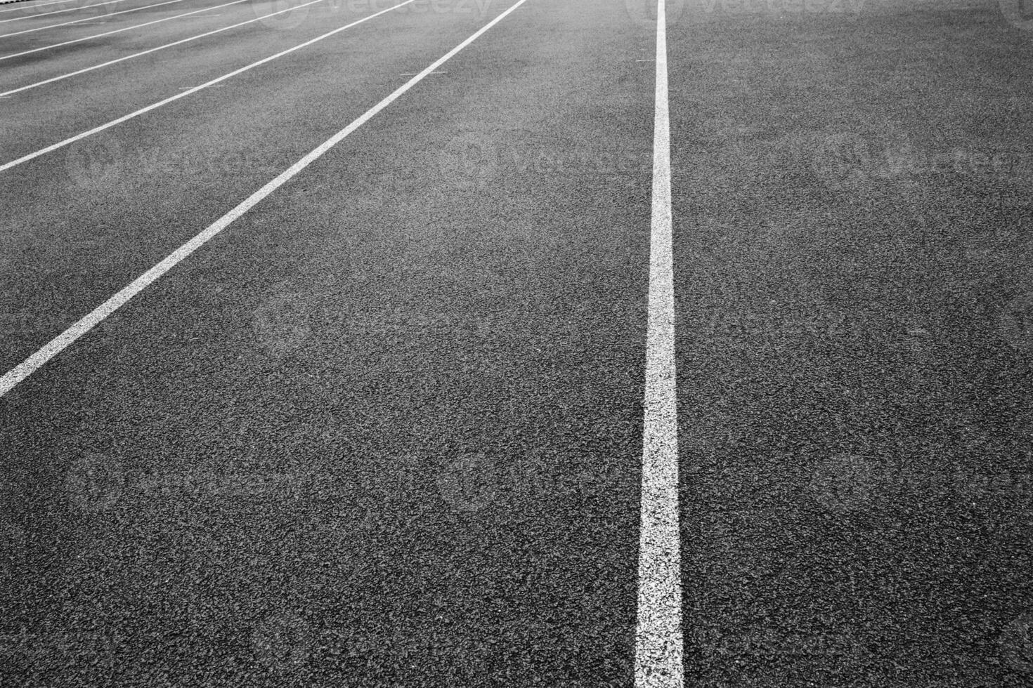 corriendo pista con blanco líneas foto