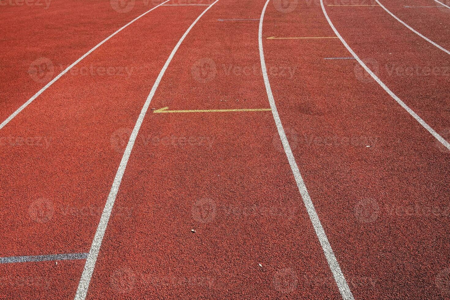 red runway with change markings for a relay race photo