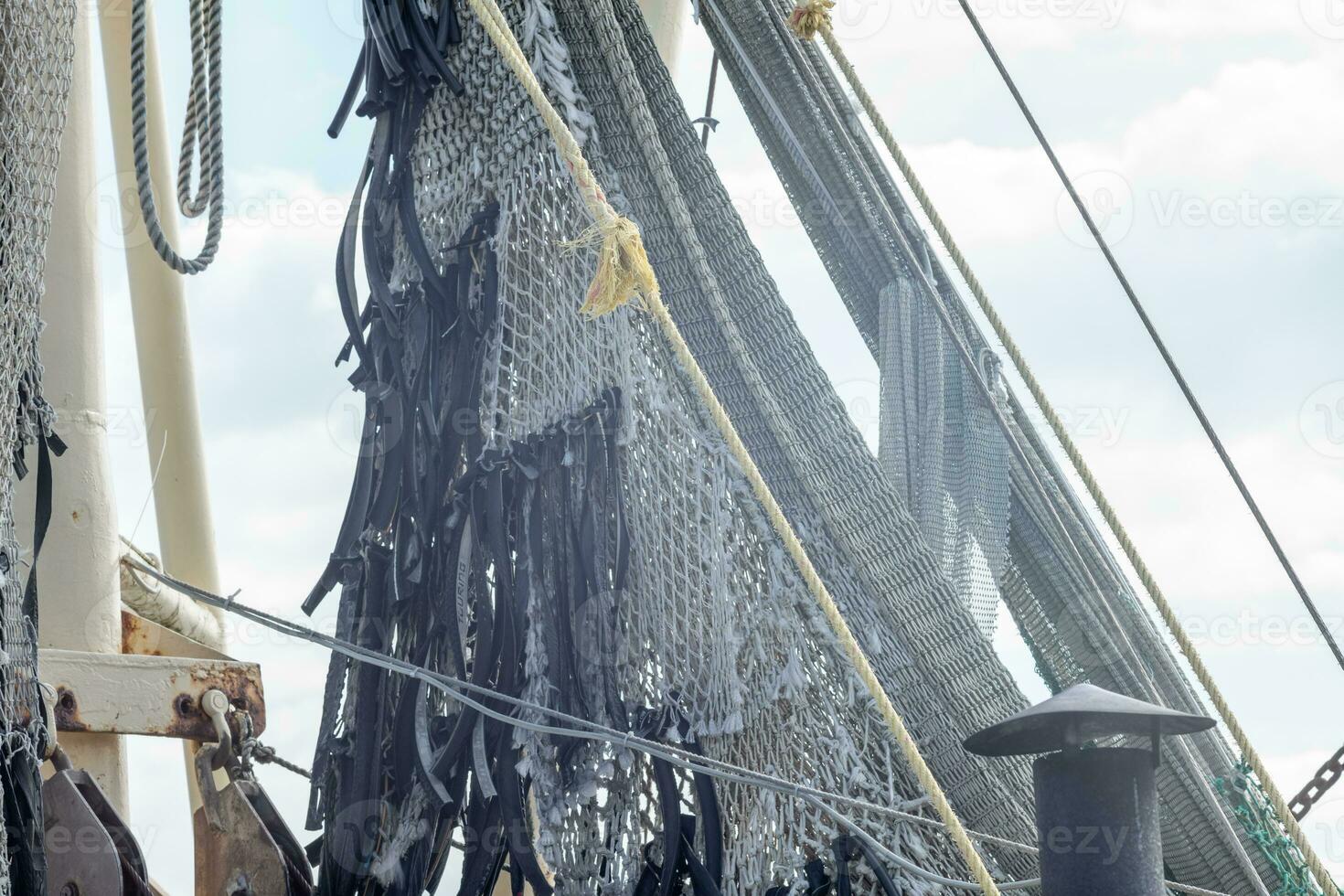 nets in the harbor in the sun photo