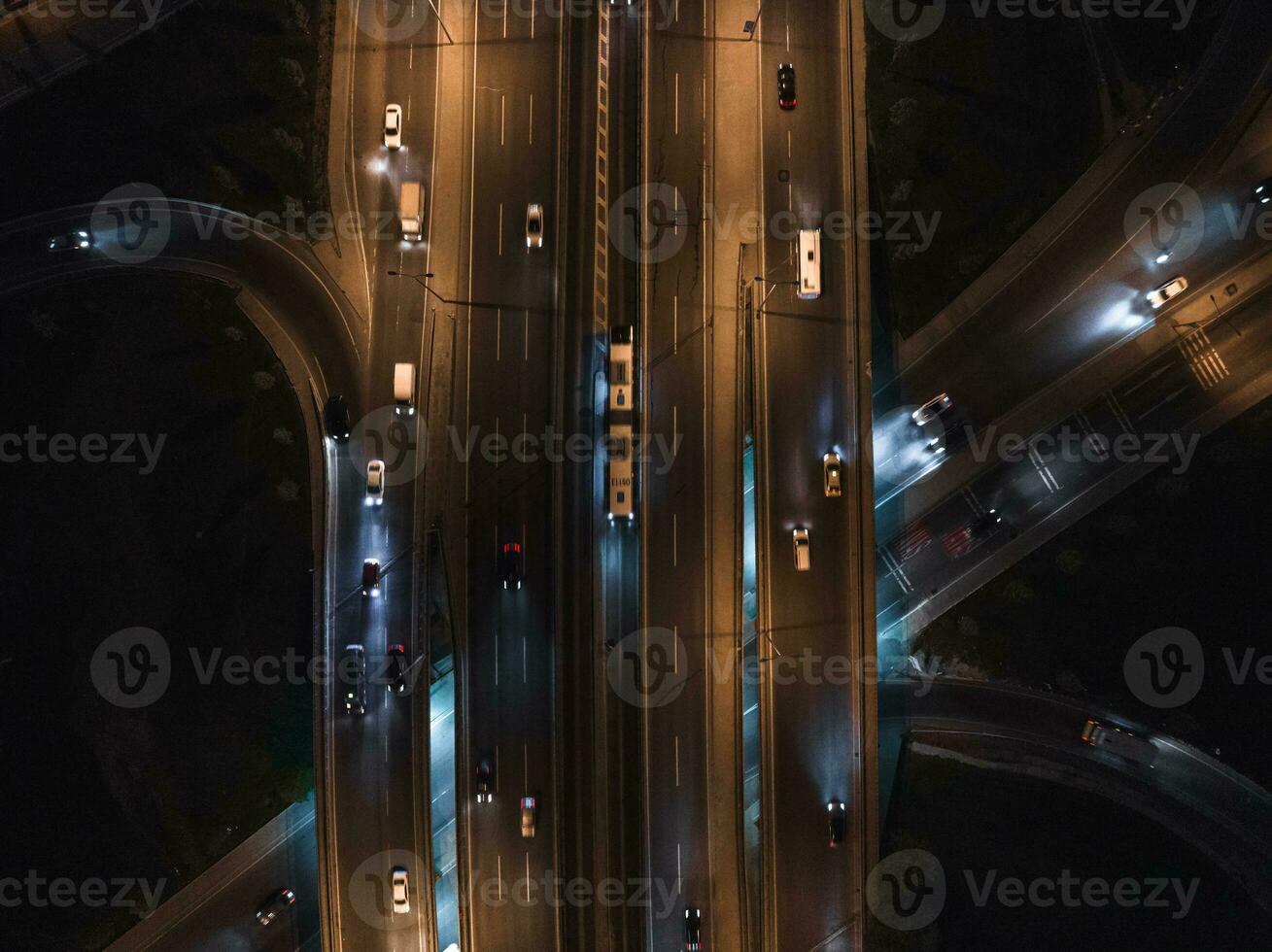 Top view of car traffic transport on crossing multiple lanes highway photo