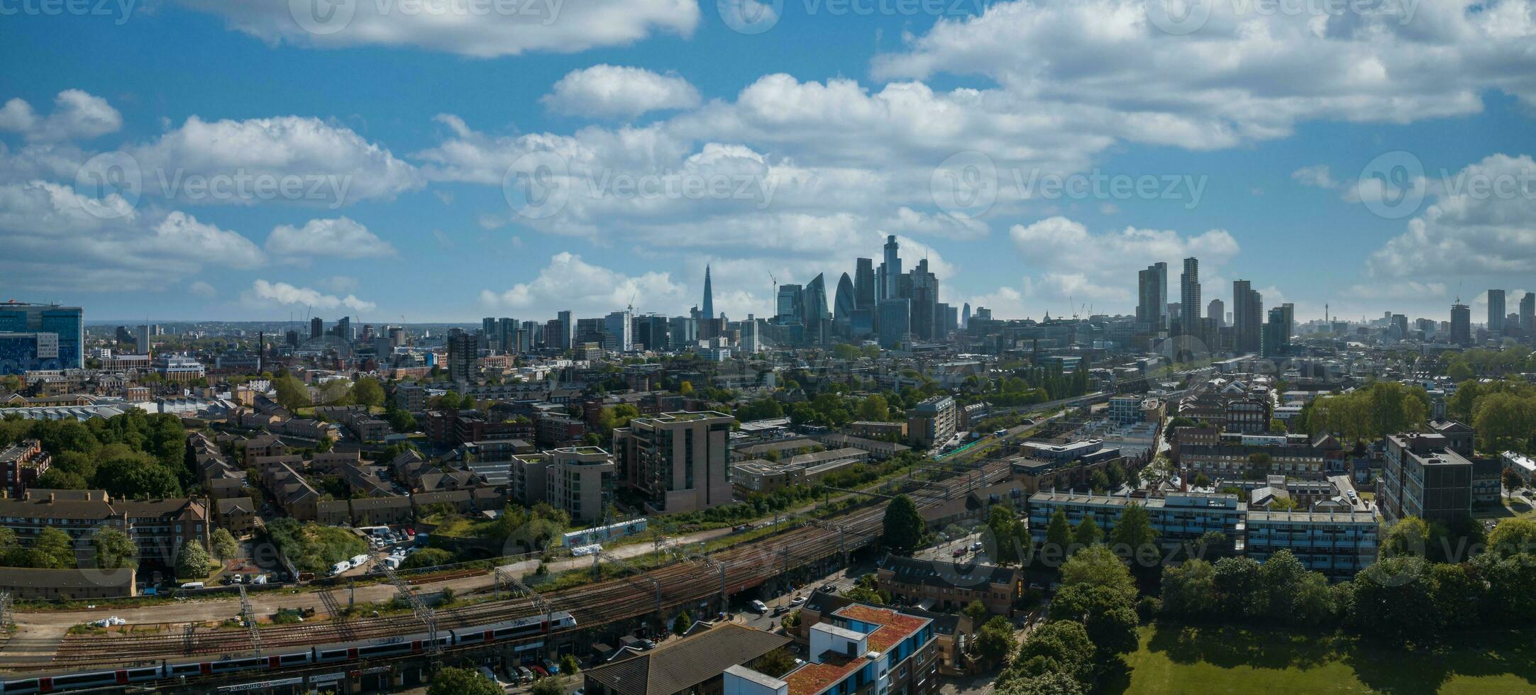 Panoramic aerial view of the city of London center with skyscraper buildings on the horizon. photo