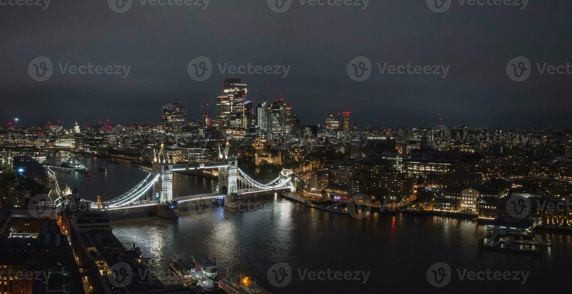 Aerial night view of the Tower Bridge in London. photo