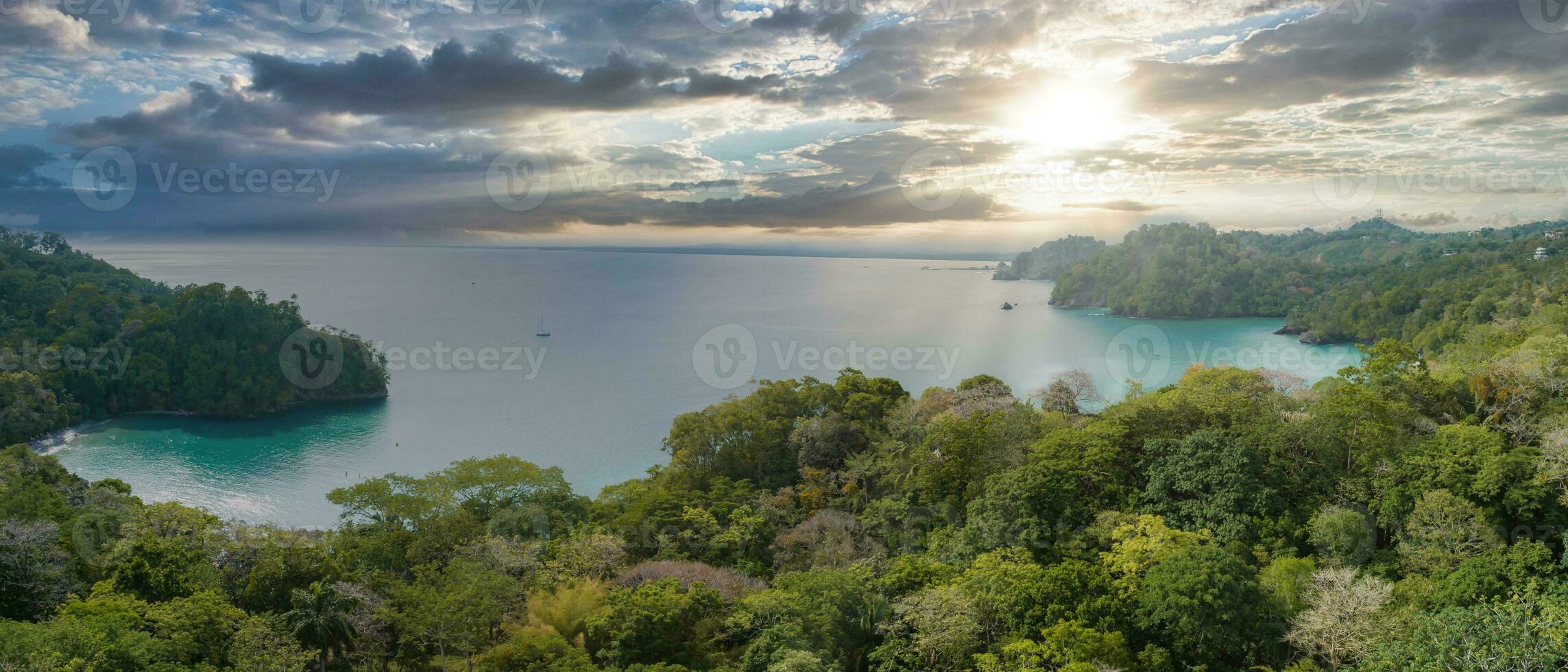 Aerial photo of the Pacific Ocean meeting the beaches and rainforest Costa Rica