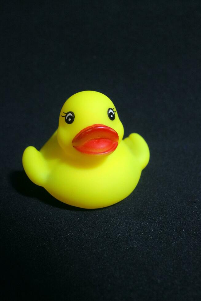 Cute little yellow toy duck with red lips 24820052 Stock Photo at Vecteezy