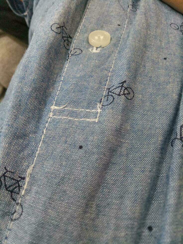 Photo of a gray cloth texture with a bicycle image