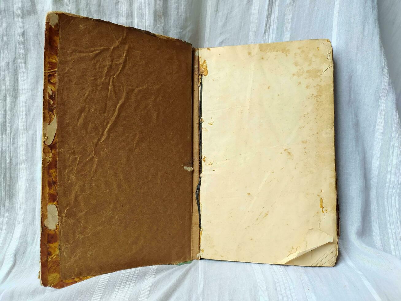 An old brown book with a vintage texture photo