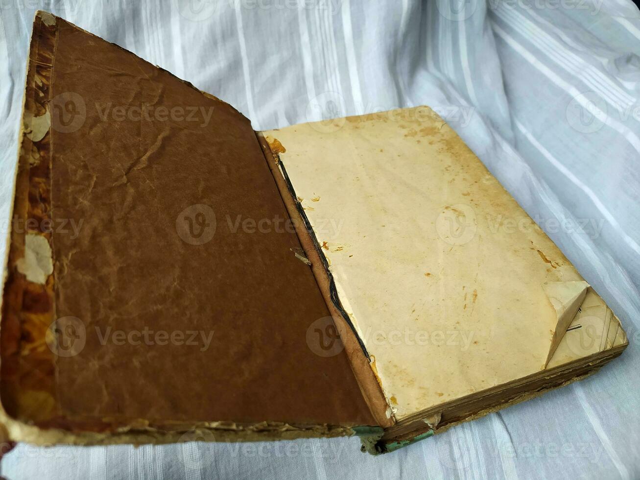 An old brown book with a vintage texture photo