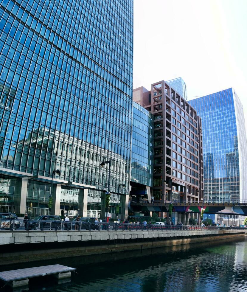 Low Angle Panoramic View of Canary Wharf Buildings at Central London City of England Great Britain. The Footage Was Captured on 08-June-2023 During Clear Day. photo