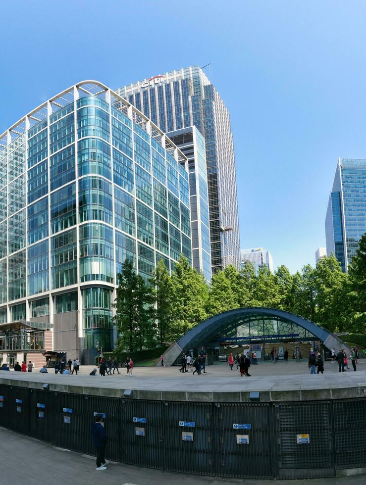 Low Angle Panoramic View of Canary Wharf Buildings at Central London City of England Great Britain. The Footage Was Captured on 08-June-2023 During Clear Day. photo
