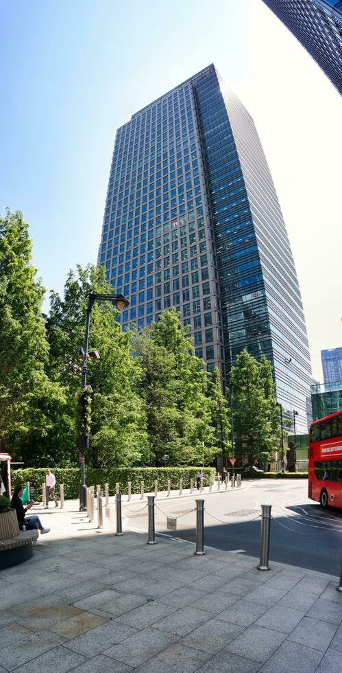 Low Angle Panoramic View of Canary Wharf Buildings at Central London City of England Great Britain. The Footage Was Captured on 08-June-2023 During Clear Day. photo