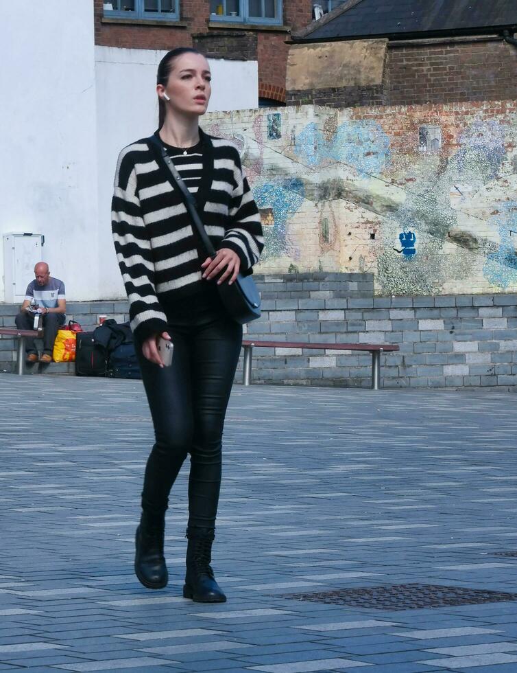 Beautiful Image of People at The Mall Shopping Centre Downtown of Central Luton City of England Great Britain for Shopping and Walking. The Image Was Captured on 02-June 2023 photo