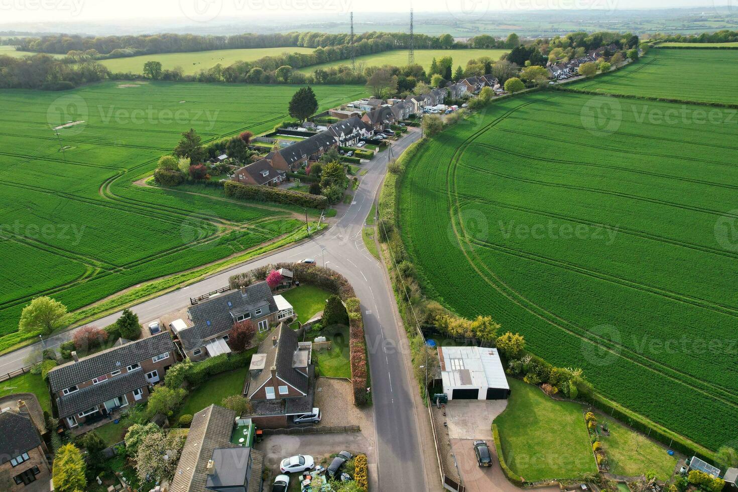 High Angle View of British Countryside Streatley Village of Luton Bedfordshire England UK. Footage was Captured with Drone's Camera on 02-May-2023 photo