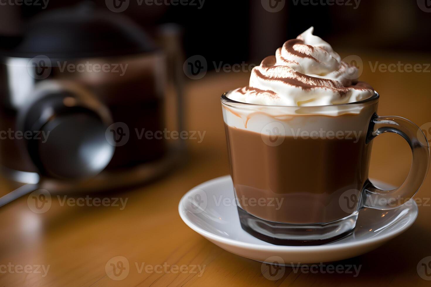 Cappuccino is served in a smaller cup and Garnish with whipped cream. . photo