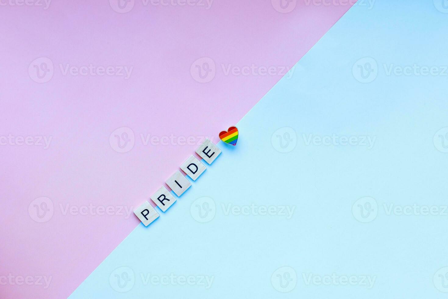 Word pride from wooden letters. Pride month and day. LGBTQ. photo