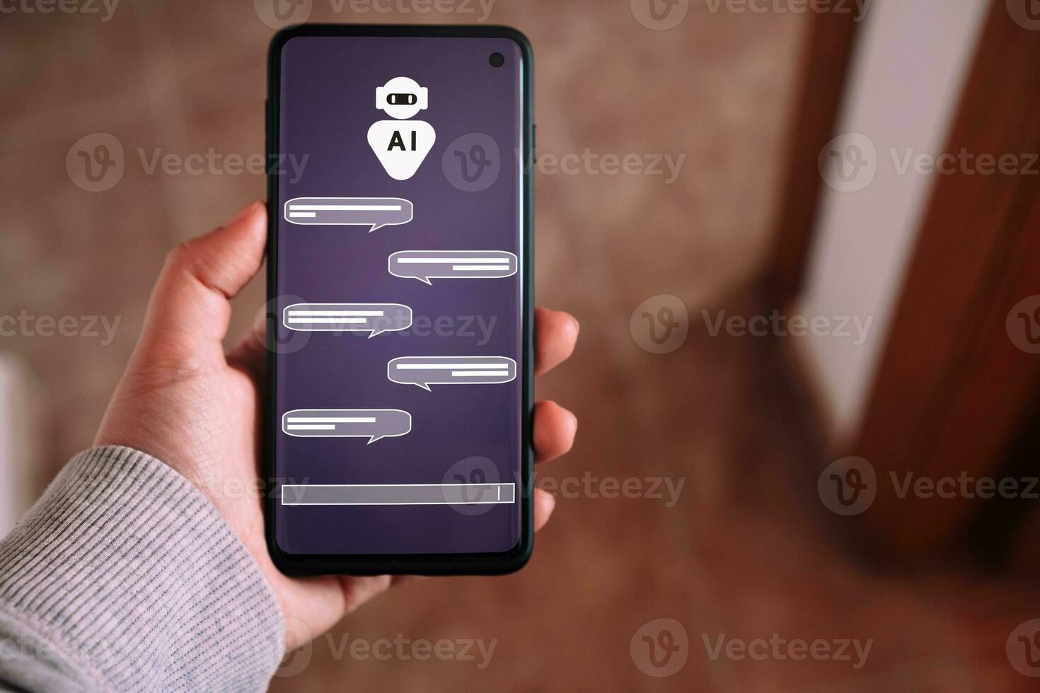 Woman showing smartphone while using a chatbot. Command prompt AI concept. Artificial Intelligence. Futuristic technology transformation. photo