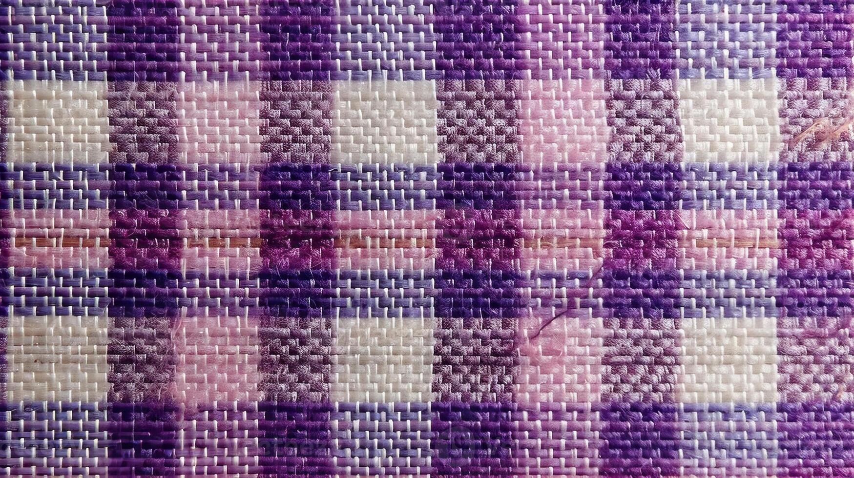 Purple and white checkered fabric pattern. photo