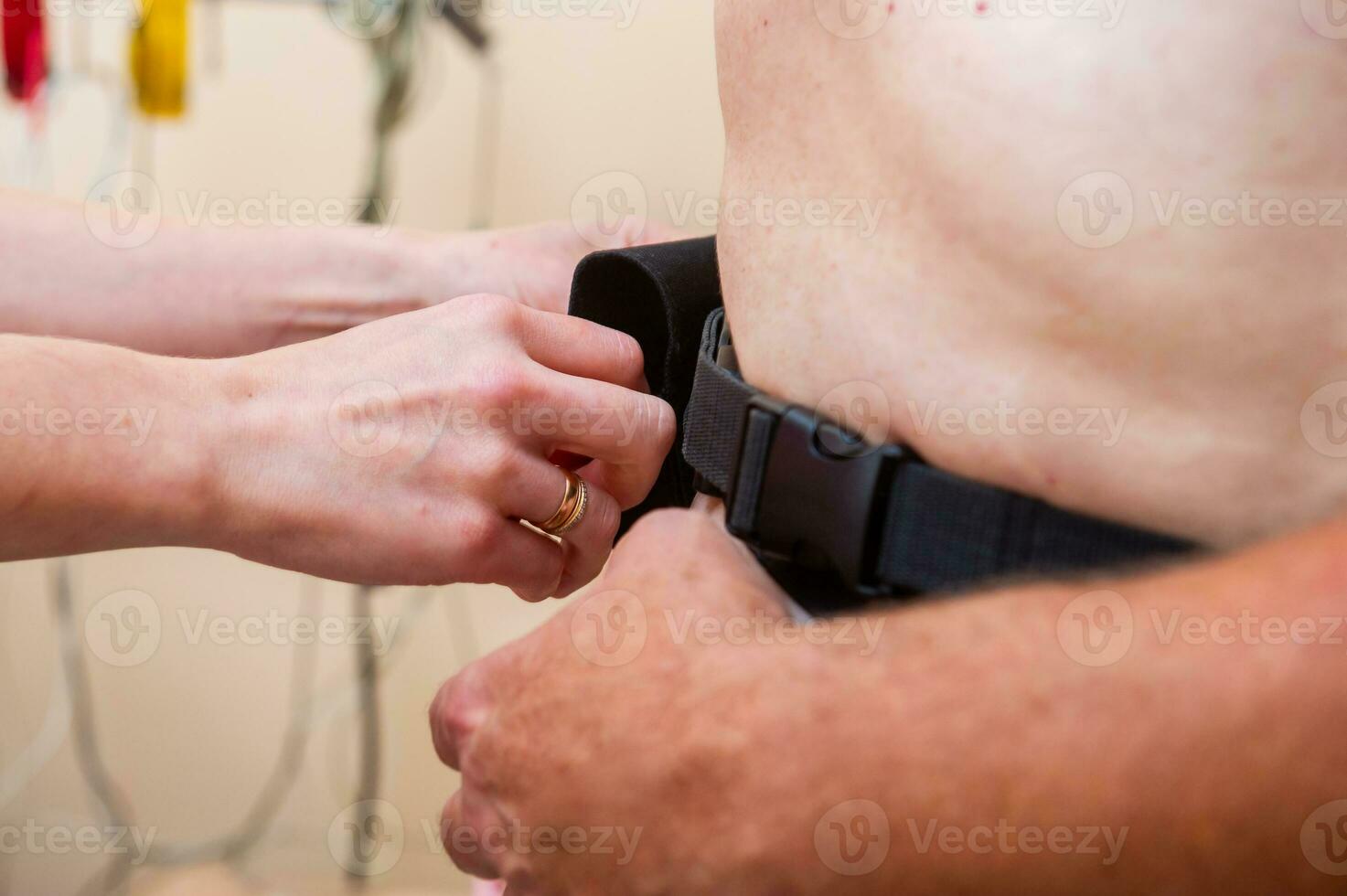 Electrocardiogram, ECG in hand. Clinic of Cardiology heart rate and pulse test closeup. photo