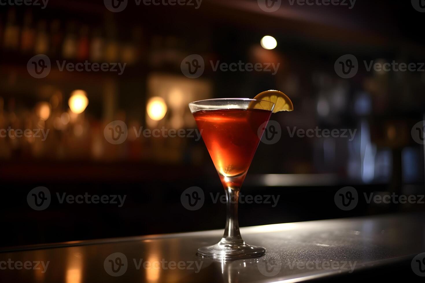 cocktail in the bar with a slice of lemon and a straw. photo